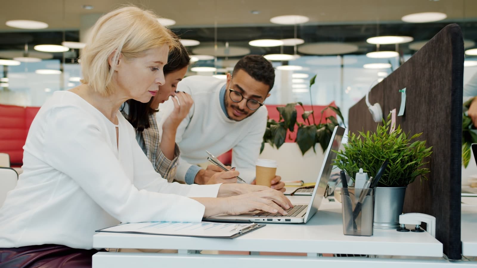 An accountant and a client reviewing records together